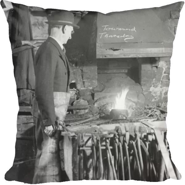 Farrier at his Forge