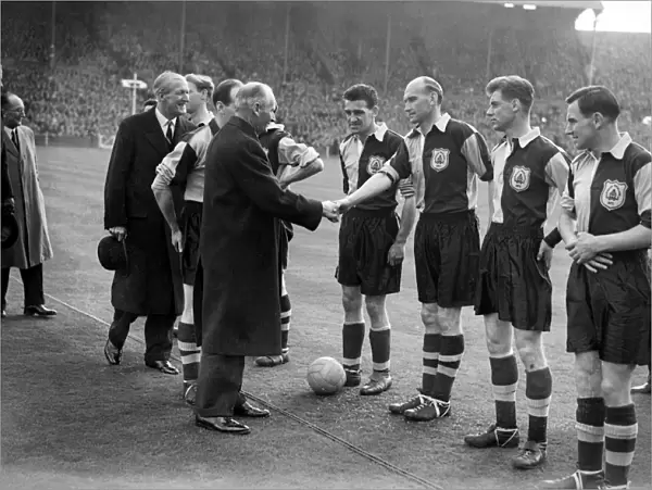Field Marshall Montgomery greets the teams before the 1955 FA Amateur Cup Final