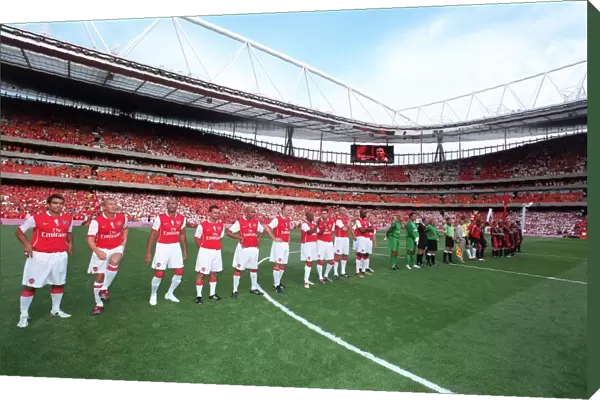 The Arsenal Legends and Ajax Legends line up before the match