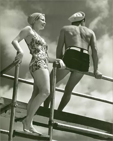 Couple on diving platform