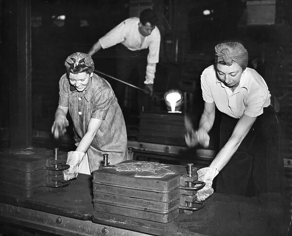 24 year old Joy fletcher and 19 year old Brenda Cawdell at work in the foundry