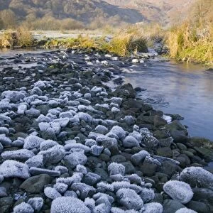 A partially frozen river in Easedale near Grasmere in the Lake District during a cold snap Global warming has caused a recent spate of mild winters making freezing conditions like this much less