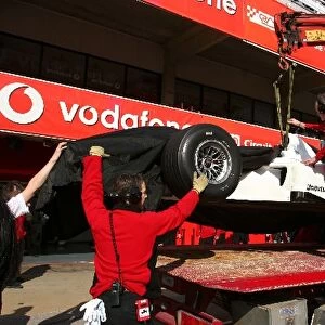 Formula One Testing: The car of Takuma Sato Super Aguri F1 is brought back to the pitlane