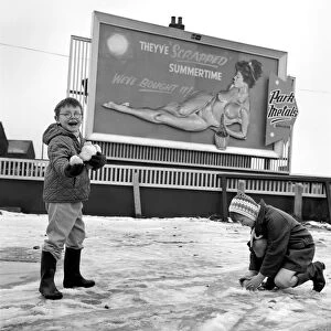 Nude poster story. Two youngsters out playing in the snow