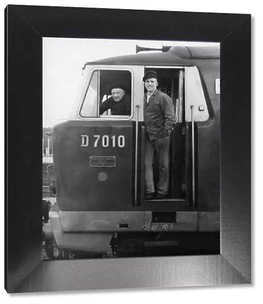 Drivers Ernie Simms and Brian Kervin on board diesel locomotive No. D7010