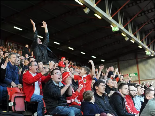 Bristol City Fans in Full Swing: Cheering on Their Team against Preston North End at Ashton Gate, 2014