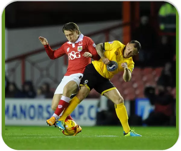 Bristol City vs AFC Wimbledon: Luke Freeman Tackled by Barry Fuller in Johnstone's Paint Trophy Clash