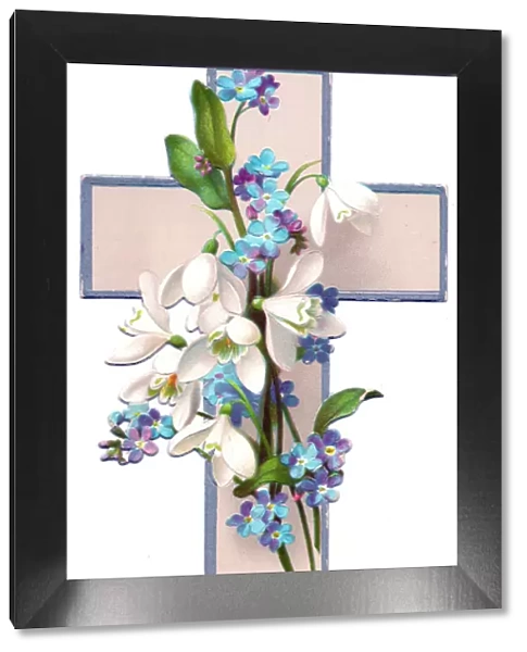 White and blue flowers on a cross-shaped Christmas card