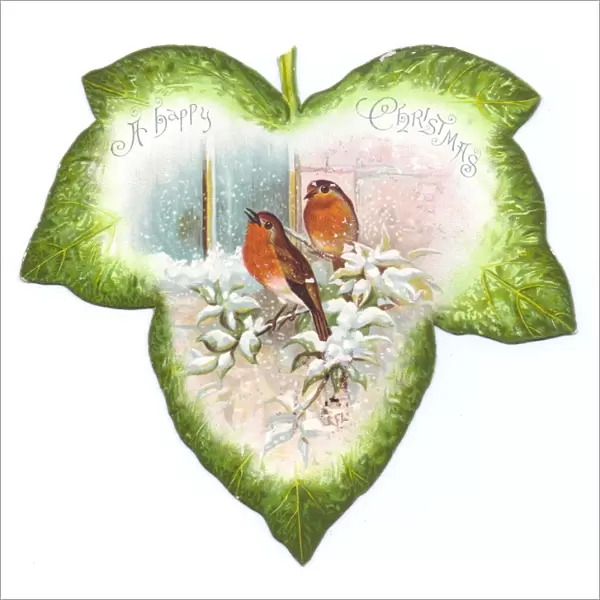 Christmas card in the shape of a green leaf with robins