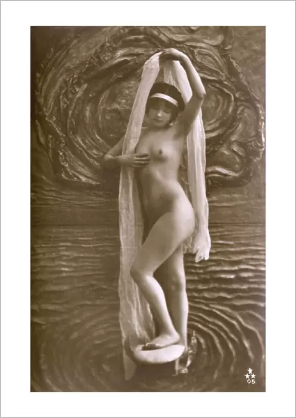 Artistic Italian nude standing amid stylised watery backdrop