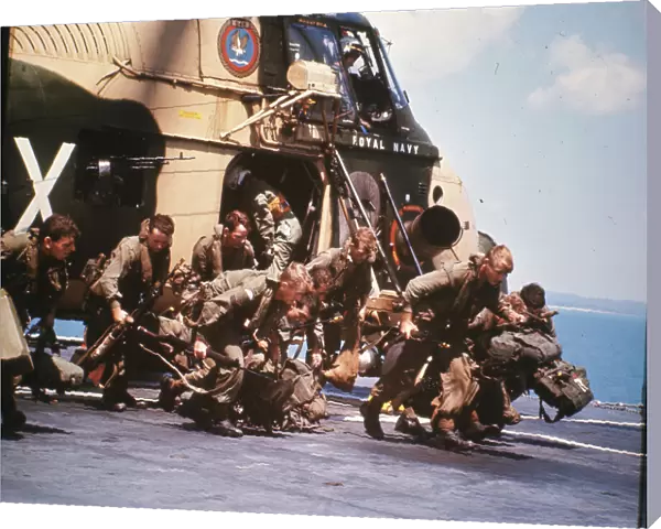 Royal Marine Commandos re-embarking from a Westland Wessex