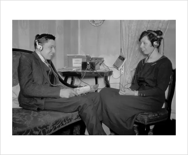 Man and woman with radio equipment