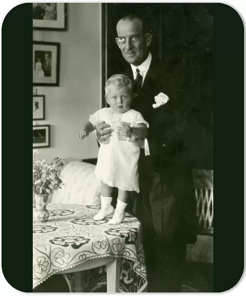 Prince Andrew of Greece with his eldest child, Margarita