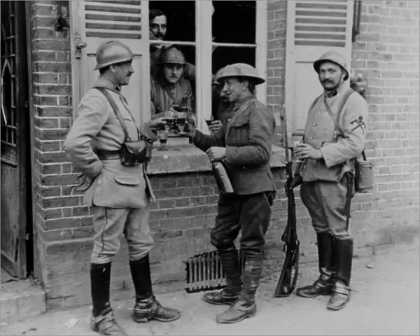 British and French soldiers enjoying a drink, WW1