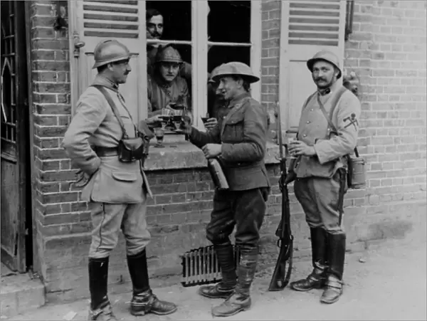 British and French soldiers enjoying a drink, WW1