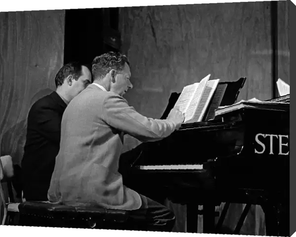 Benjamin Britten working on his score