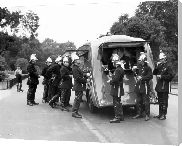 Firefighters outside a canteen van, Battersea, London