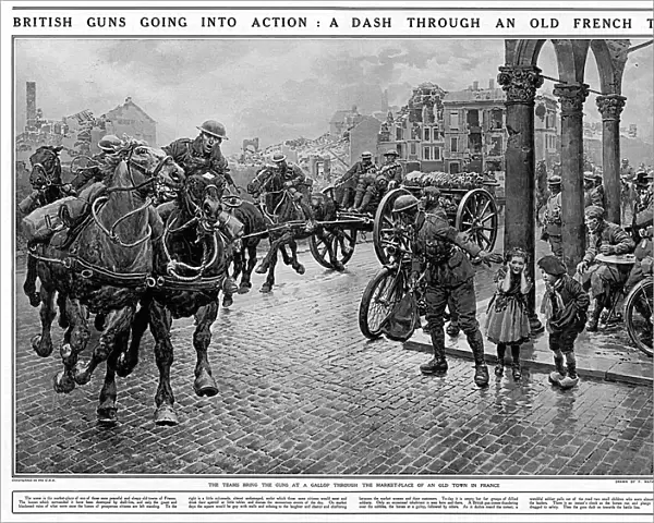 British Guns dash through French town