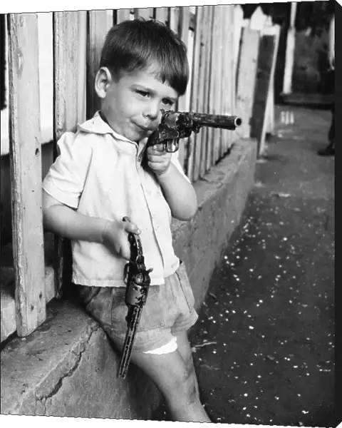 Boy with two guns, Balham, SW London