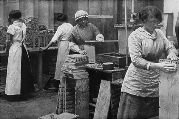 Girls at work making ammunition boxes, WW1