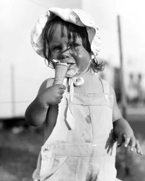 Little girl enjoying an ice cream