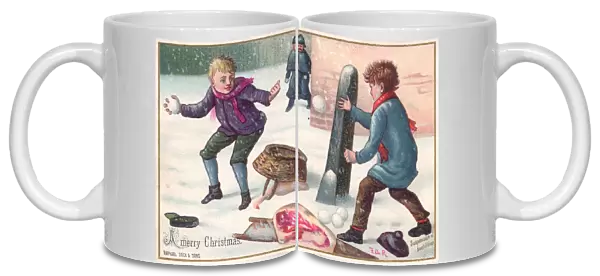 Two boys snowballing on a Christmas card