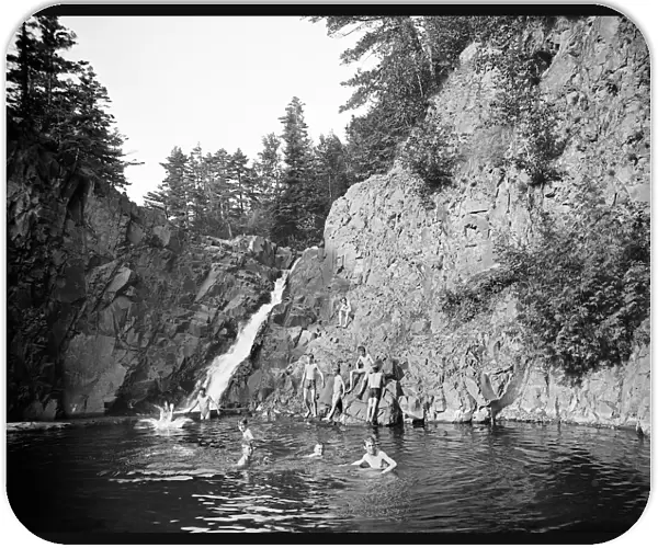 Children swimming at a swimming hole at Lester Park in Dulut