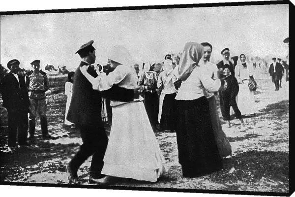 Peasants dancing on anniversary of Revolution, Russia