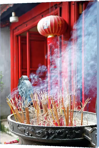 Incense sticks burning in Den Ngoc Son, Temple Hanoi