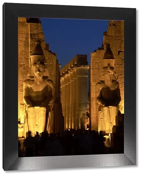 Temple of Luxor. Night view of the colossi of Ramses II