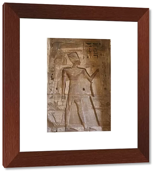 Temple of Ramses III. The pharaoh Ramses III with Khepresh