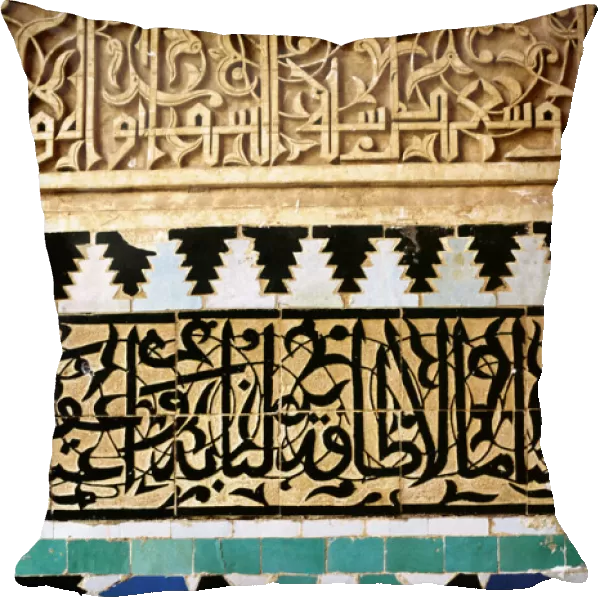 Mosaic with arab and kufic caligraphy (top) on a wall of the