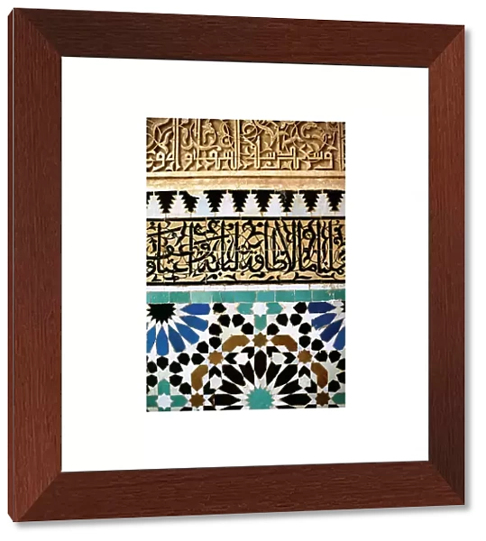 Mosaic with arab and kufic caligraphy (top) on a wall of the