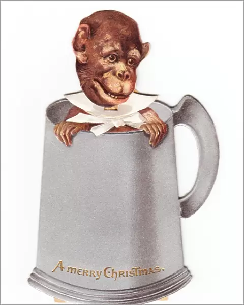 Monkey in a tankard on a movable Christmas card