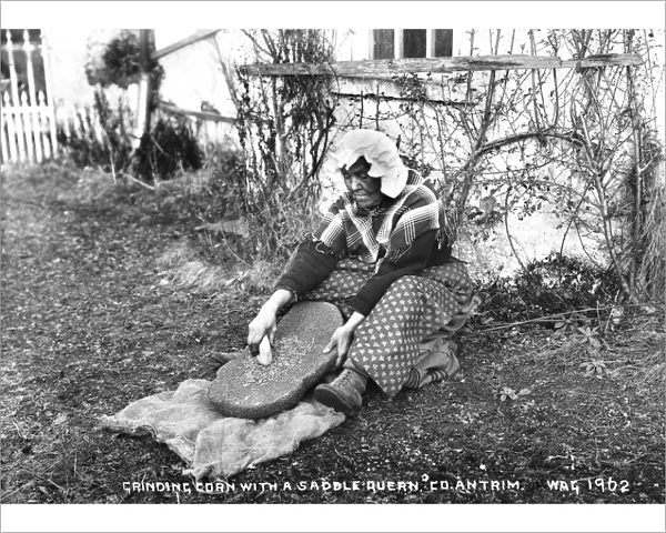 Grinding Corn With a Saddle Quern, Co. Antrim