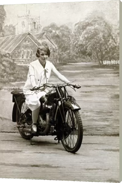 Young lady on a 1928  /  9 veteran JAP engined motorcycle