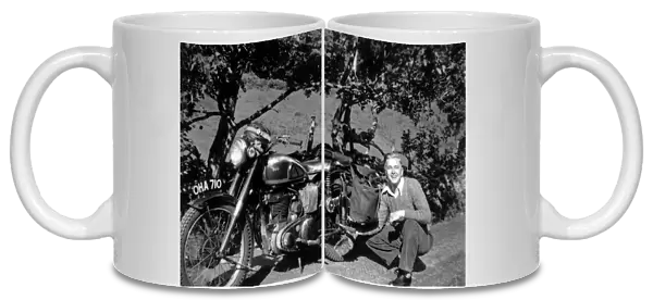 Man & 1948 BSA motorcycle