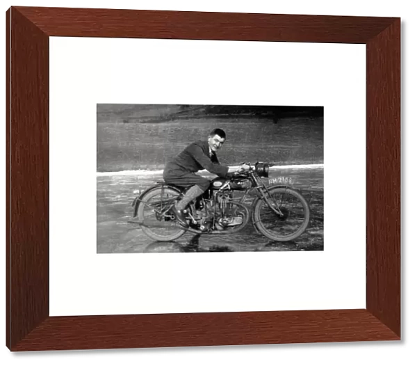Gentleman on a 1926 AJS motorcycle