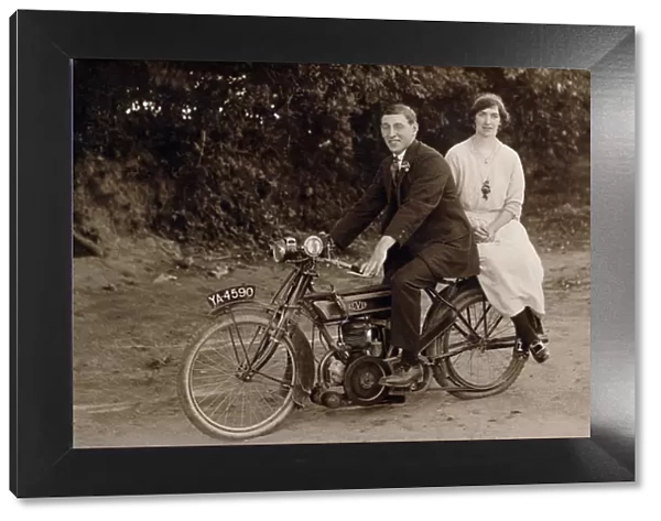 Gentleman & lady on their 1918 Levis motorcycle