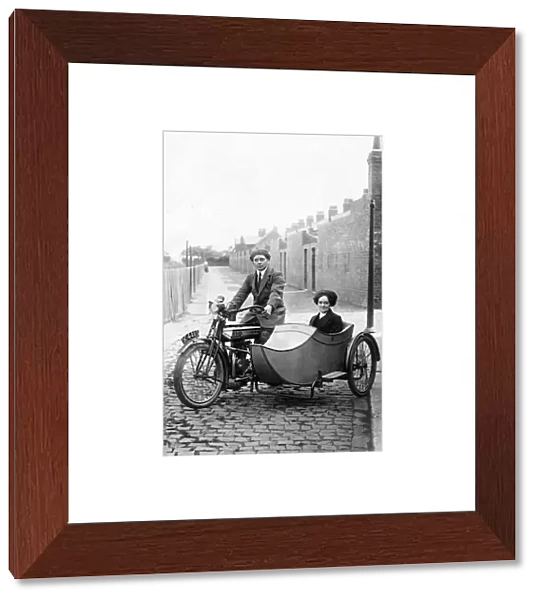 Gentleman & lady on 1920 Rudge Multi motorcycle & sidecar
