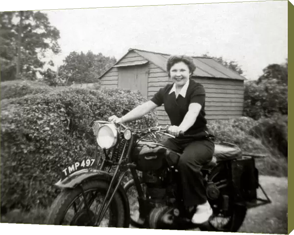 Woman on a 1938 Ariel motorcycle