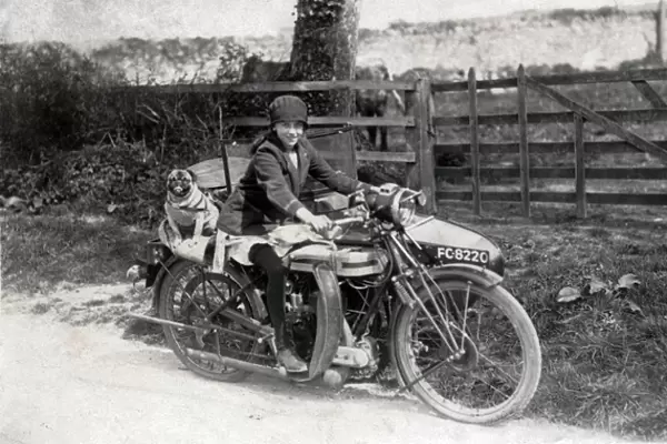 Girl & dog on a 1921 Triumph SD motorcycle & sidecar