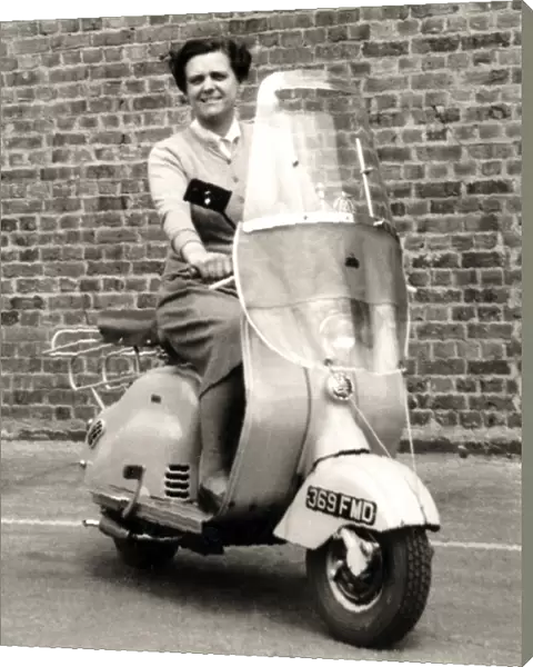 Lady on 1950s scooter