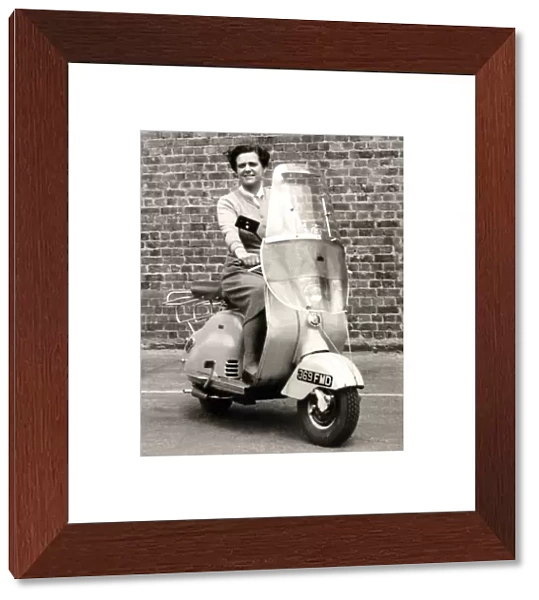 Lady on 1950s scooter