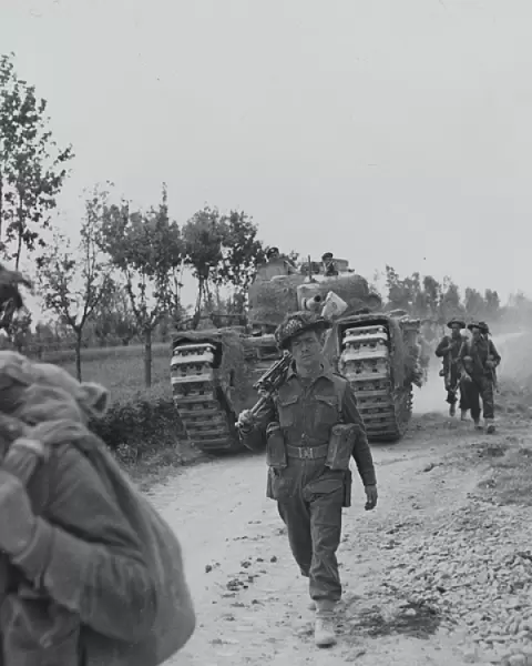 Infantry and supporting tanks advancing along the Argenta ro