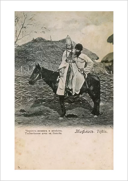 Tbilisi, Georgia - Husband on horseback with young fiancee