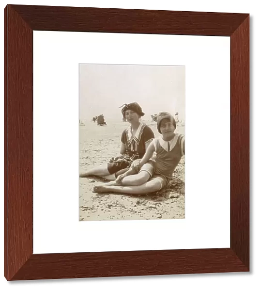 Two sisters on the beach, Southwold, Suffolk