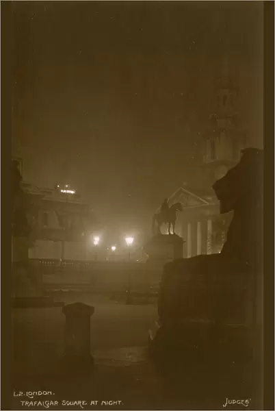 Trafalgar Square, London on a foggy night