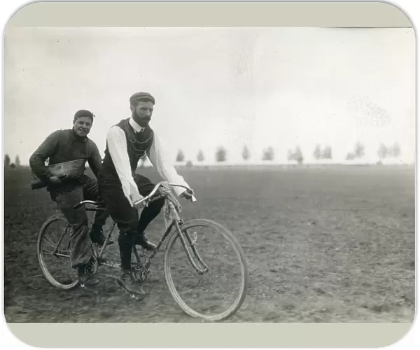 Henry Farman, 1874-1958, on the front of a tandem bicycle