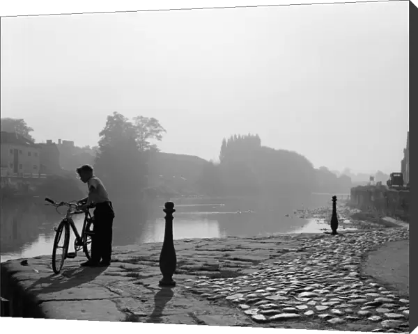 Boy and Bicycle by the River Severn